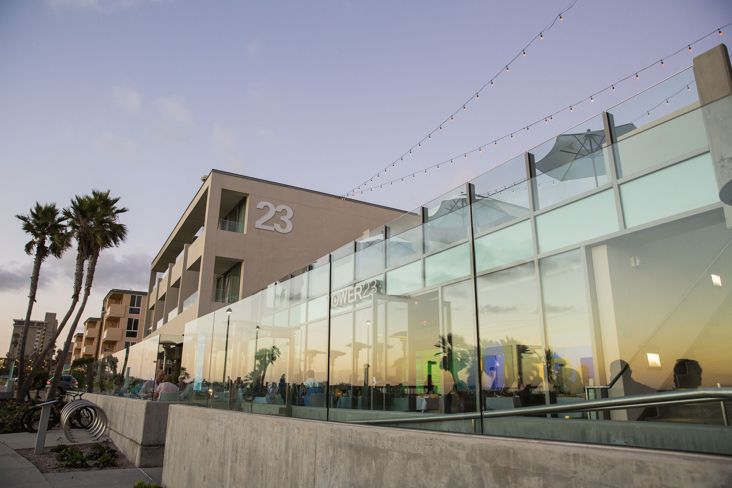 View of the outside of Tower23 Hotel and JRDN restaurant on the Pacific Beach boardwalk