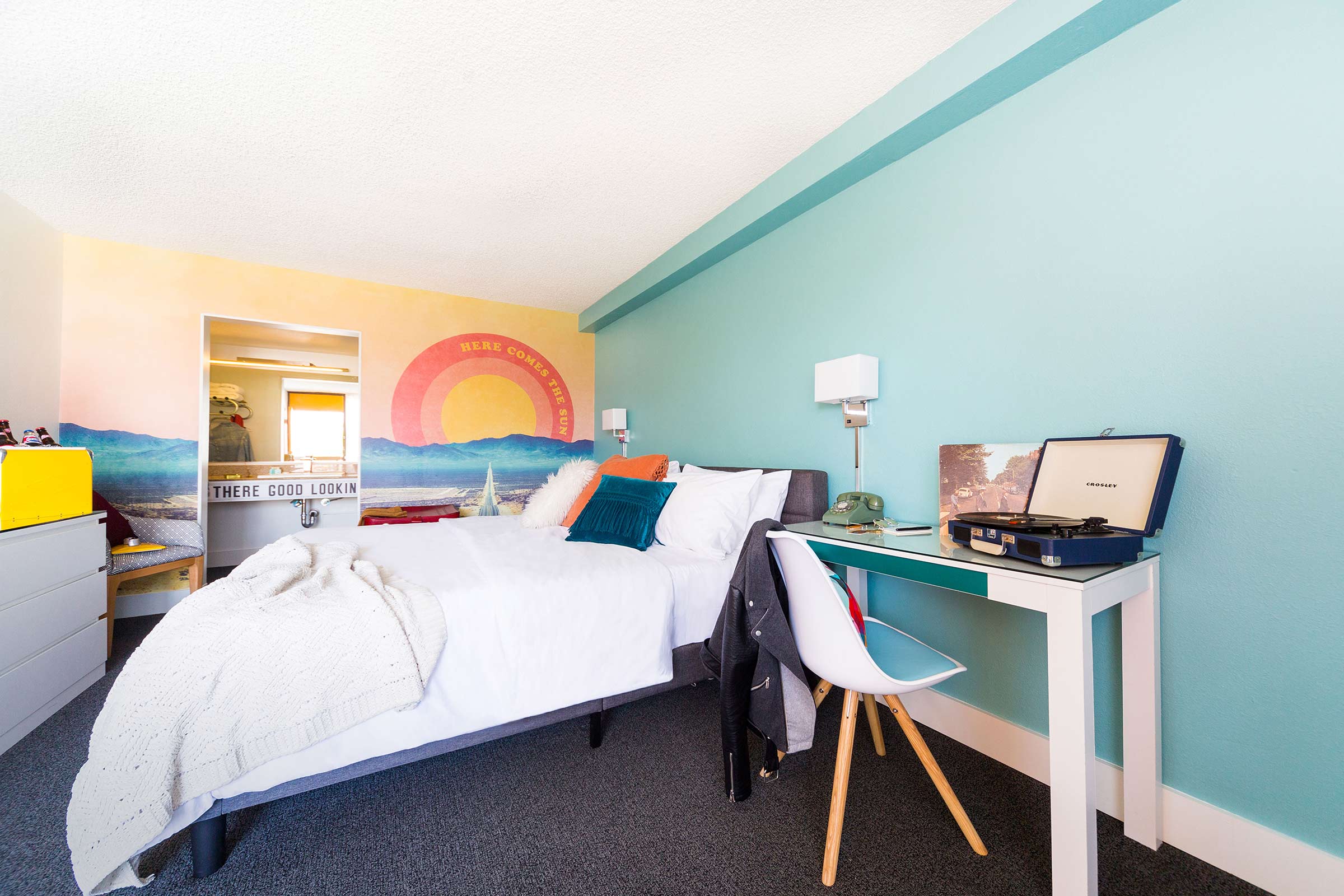 Here Comes the Sun Rambler Motel Guest room styled with a record player