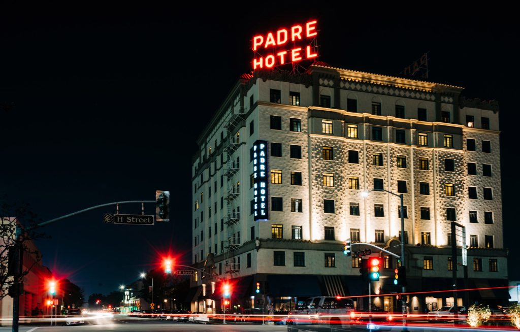 The Padre Hotel lit up at night in downtown Bakersfield