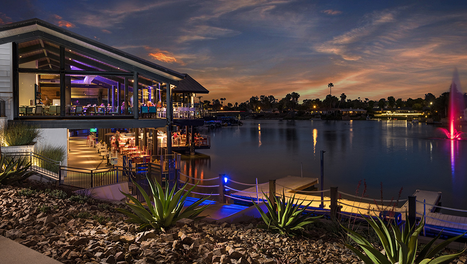 View of Decoy Dockside restaurant at night on Lake San Marcos