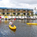 View of kayaks in front of Lakehouse Hotel and Resort